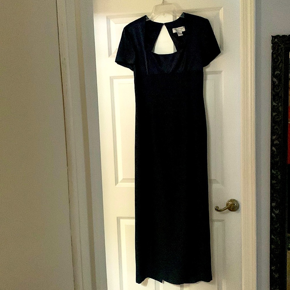 Evening length. Cap-sleeved. Empire waist. Open/keyhole back.